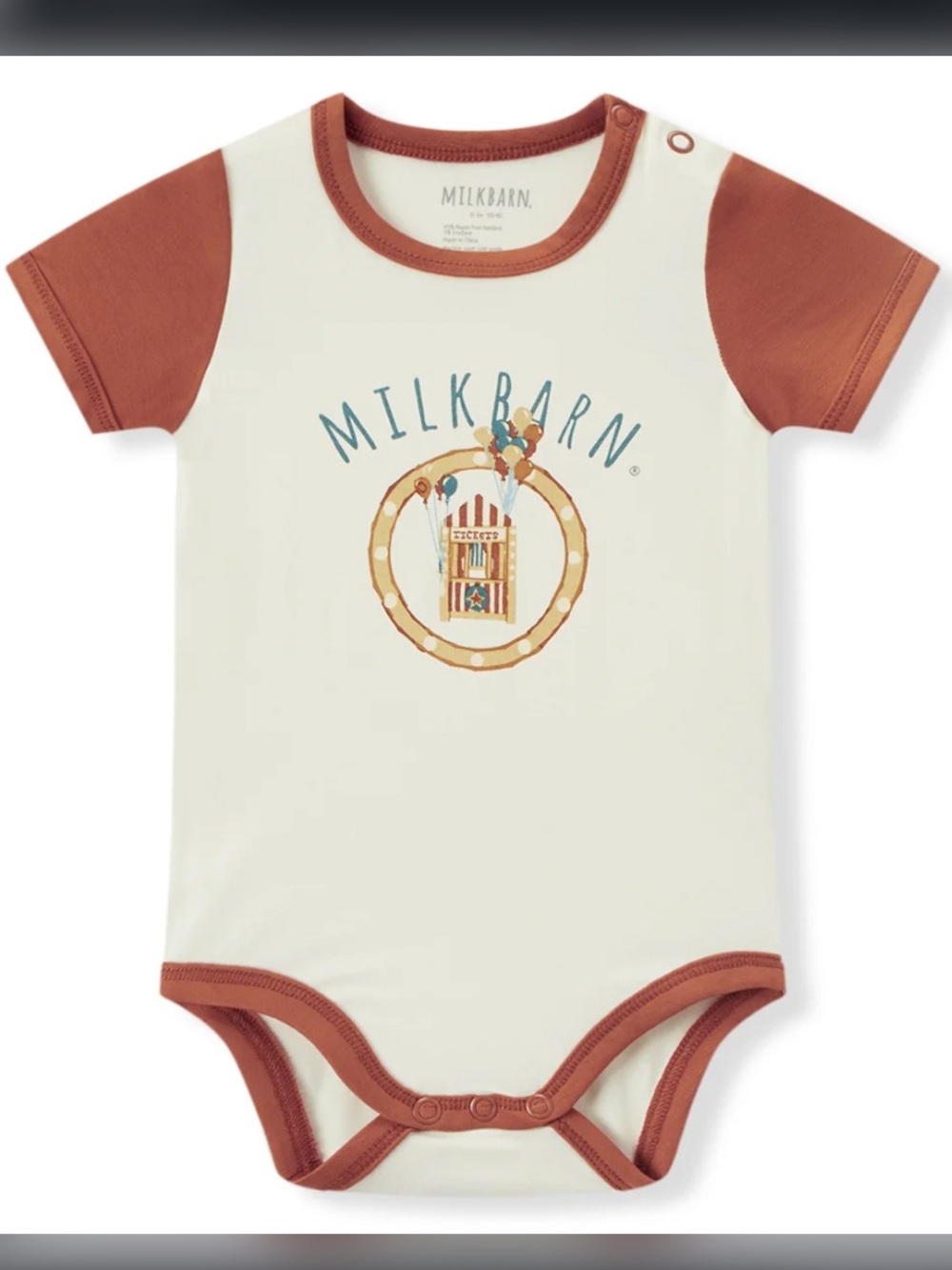 Milkbarn Cream Onesie with Rust Trim and Playful Front Graphic